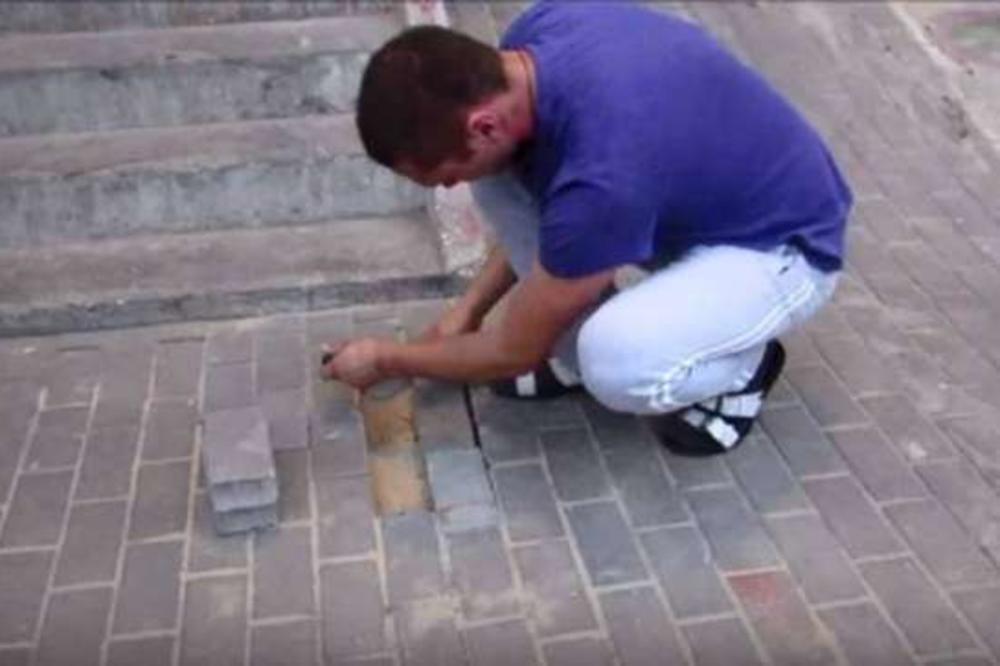 ČUO JE NEOBIČAN ZVUK IZ PLOČNIKA: Kada je pomerio cigle, USLEDIO JE ŠOK! Rus ostao u neverici! (FOTO)