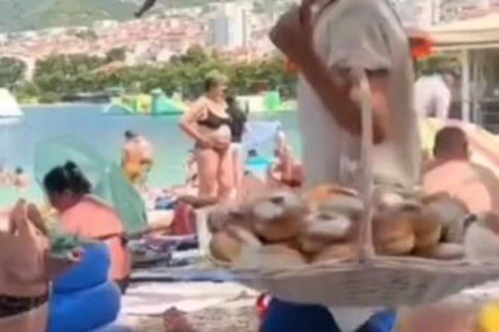 E, ovo je pravi mali biznismen: Dečak prodaje krofne na plaži, a kad čujete koliko zarađuje frapiraćete se! (VIDEO)